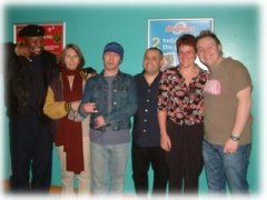 Steve and Sharon meet some of the team and Lilian - left to right - percussionist Clive, manager Lilian, guitarist Chuckie, fans Steve and Sharon, vocalist Rob